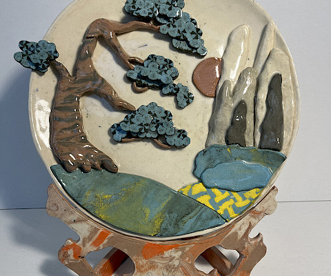 David R., "Ornamental Plate," porcelain and mason stains, Ninth Grade, Thaden School, Art Educator: Nina Buonaiuto.